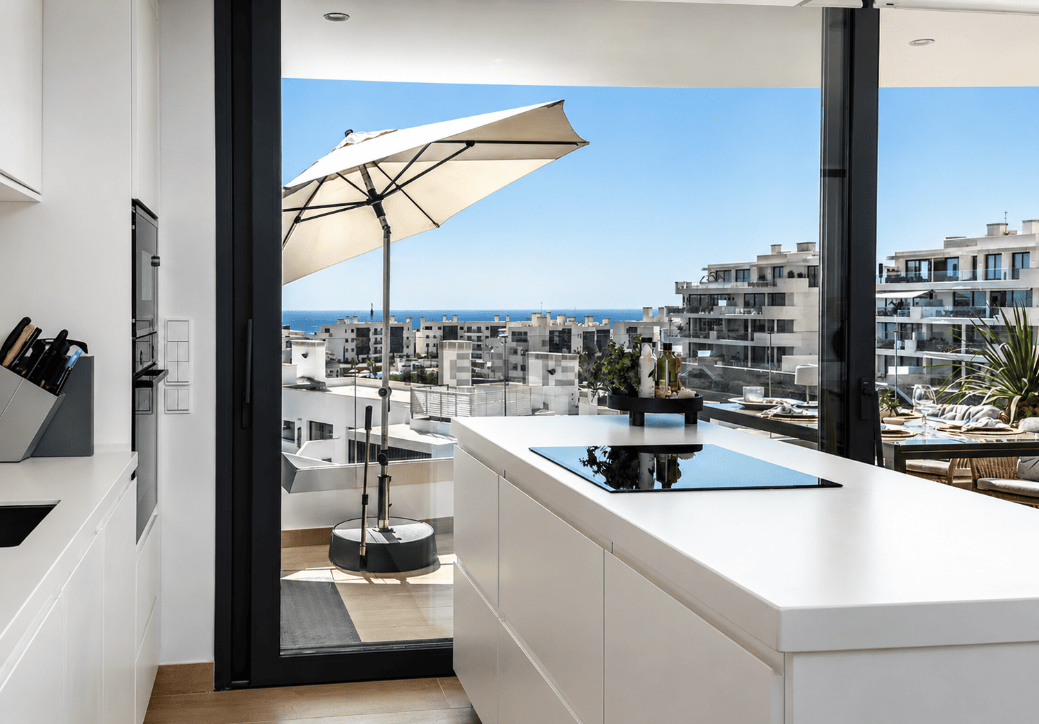 Modern kitchen island with sea views from the terrace